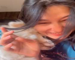 She loves spending time with her cute little dog.